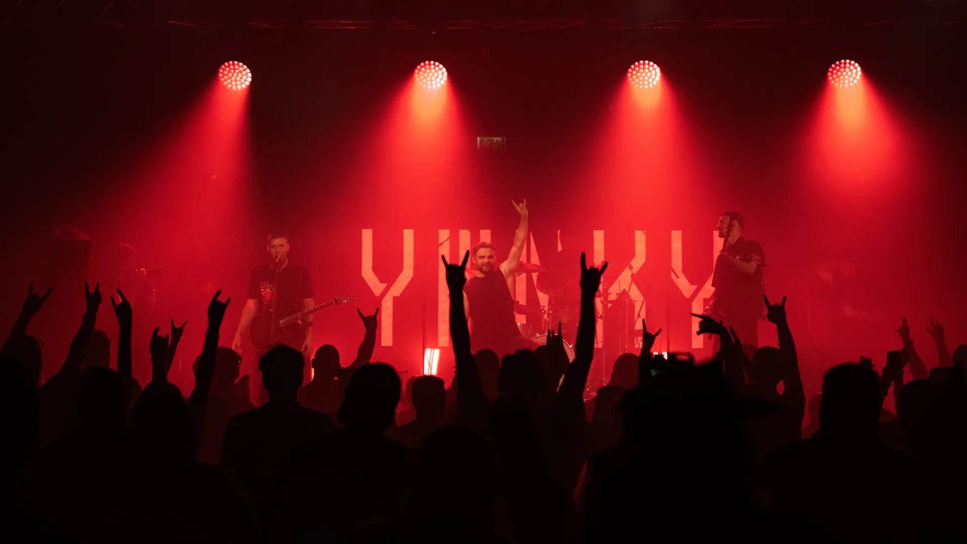 metal band playing hot show